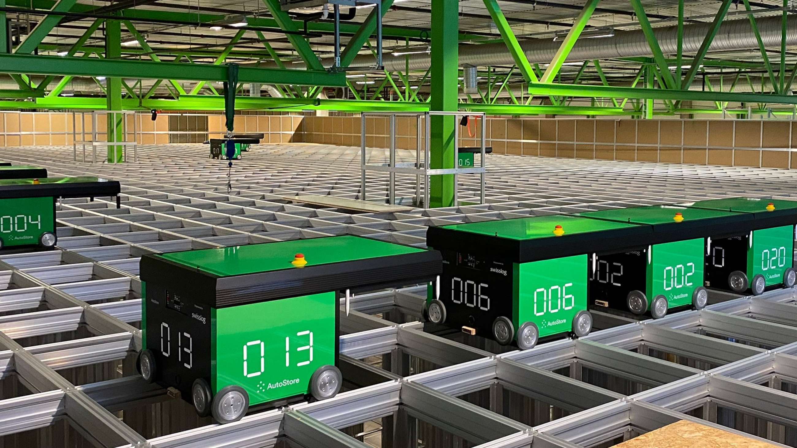 Autostore robots driving on the grid system