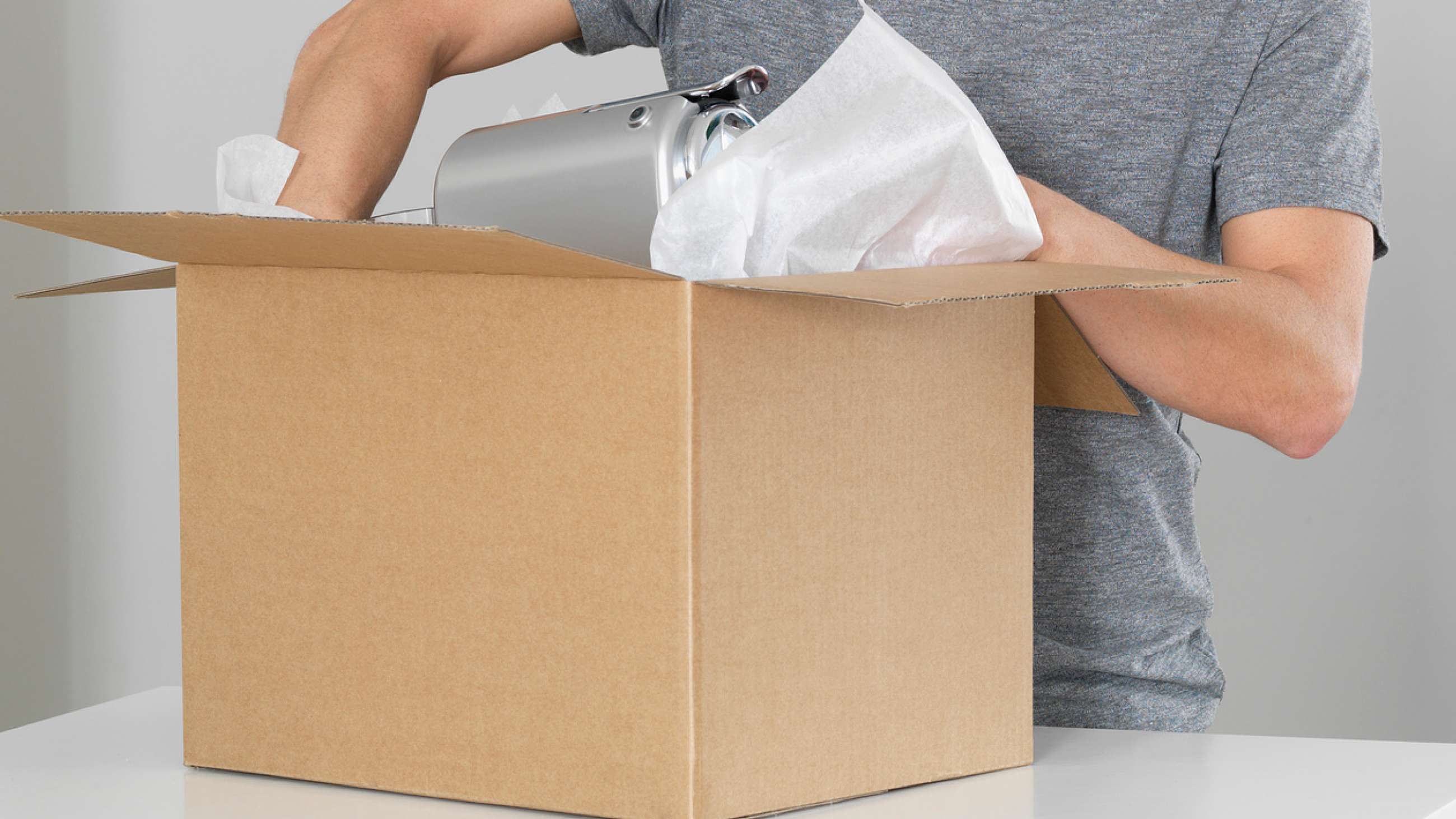 Man unpacking a parcel